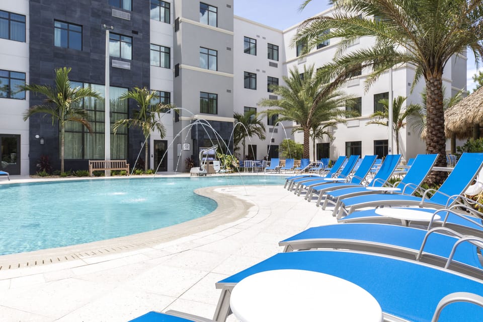 Outdoor pool, pool umbrellas, sun loungers