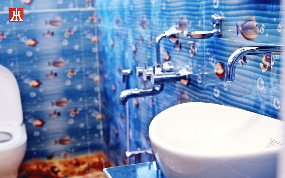 Shower, rainfall showerhead, slippers, towels