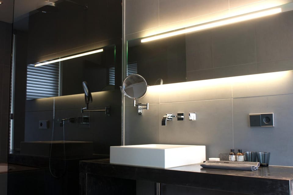 Designer toiletries, hair dryer, towels