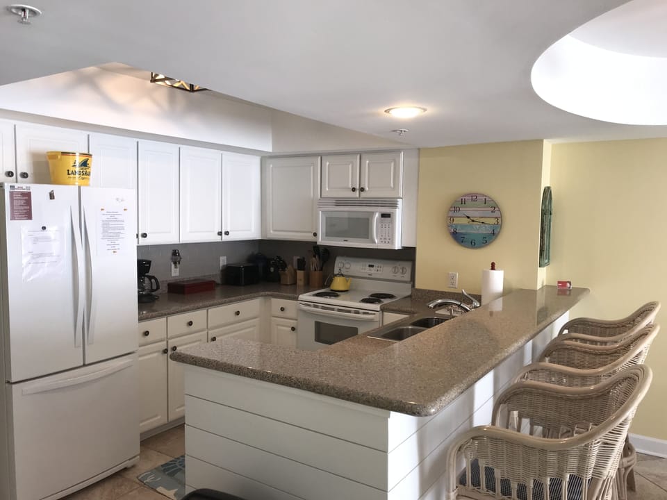 Kitchen with bar seating 