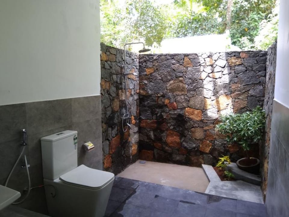 Shower, free toiletries, hair dryer, bathrobes