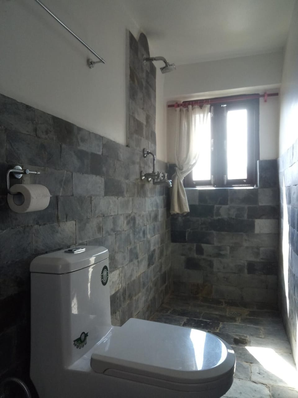 Shower, free toiletries, slippers, towels