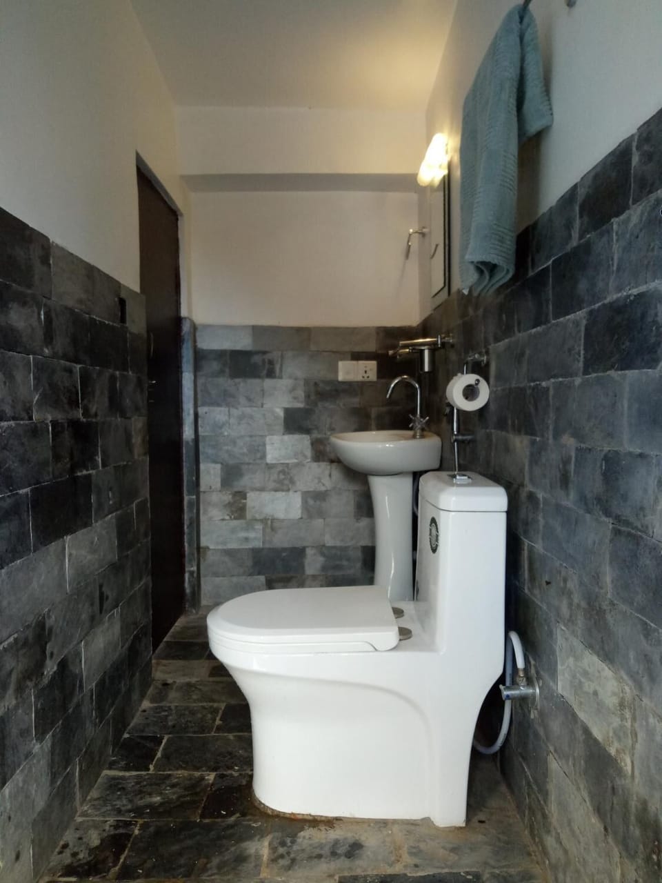 Shower, free toiletries, slippers, towels