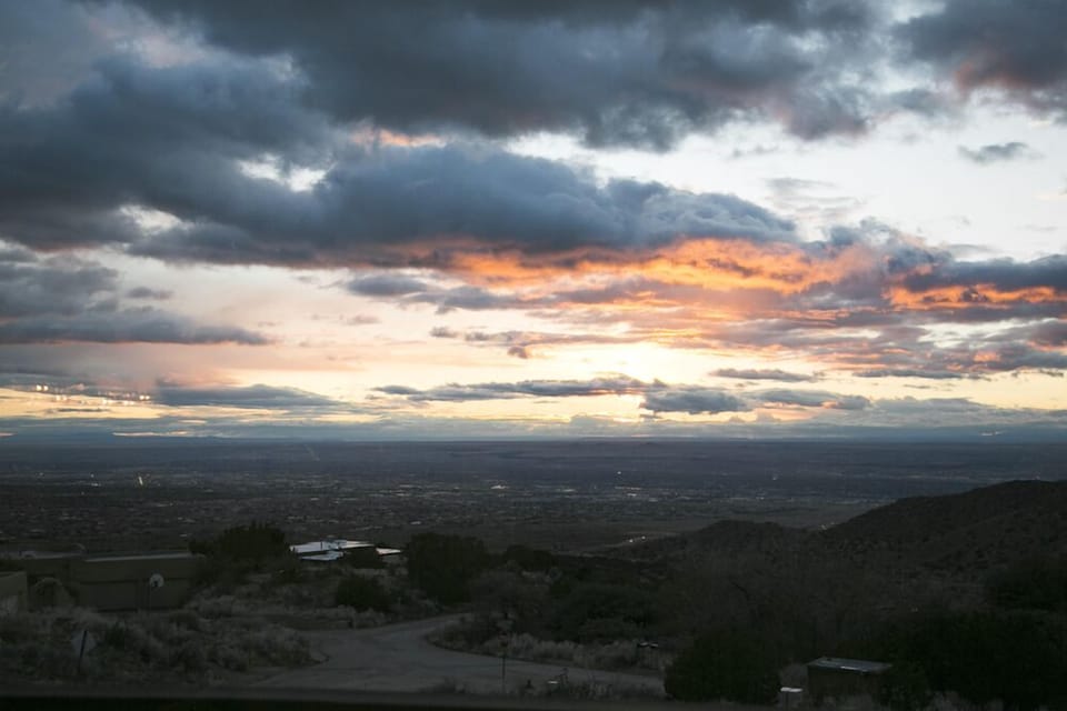Beautiful views of the city from wrap around porch, great for sunrise and sunset