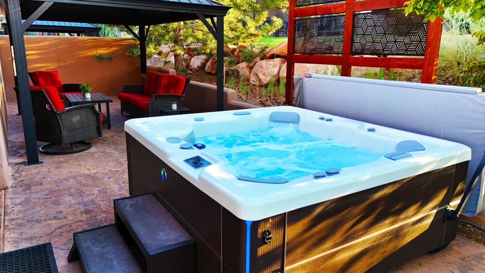 Your nightly ritual, perfected. A private hot tub sanctuary paired with a gazebo
