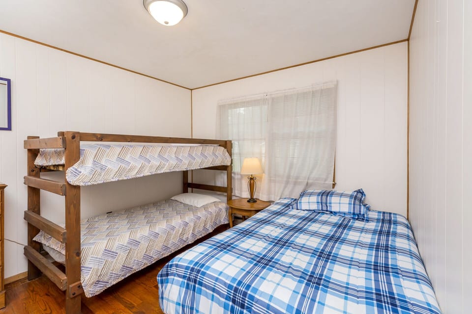 Bedroom 2 has a Full and Twin Bunkbeds - a great kids room.