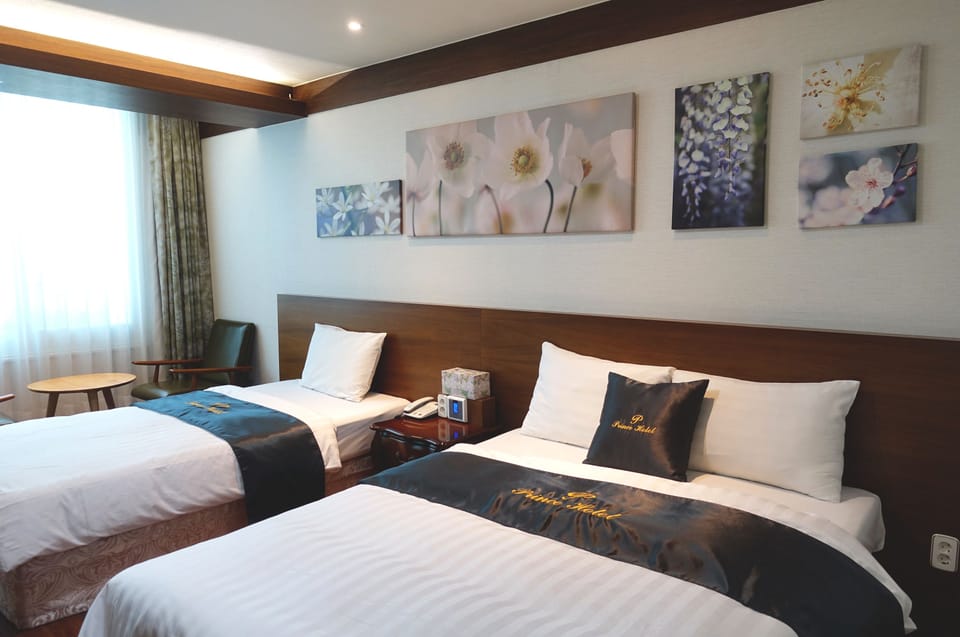 Family Room | Down comforters, free minibar, desk, free WiFi