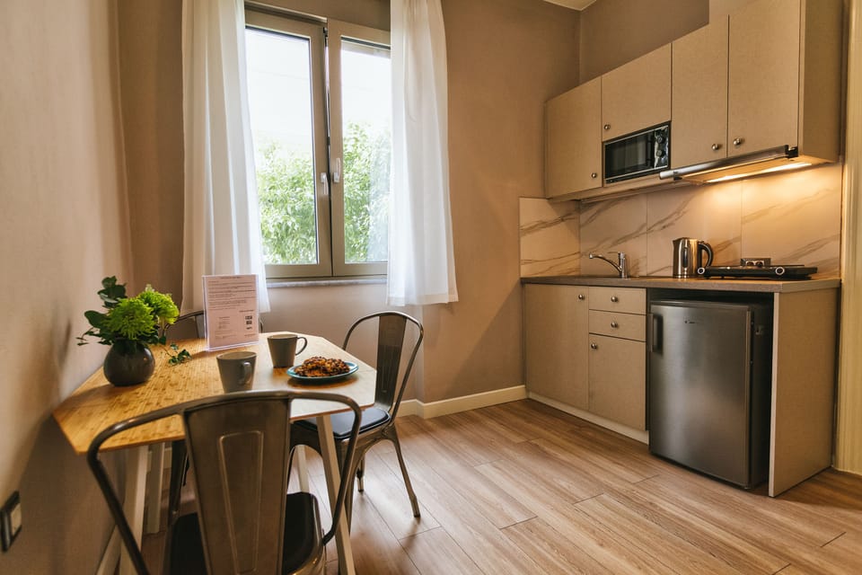 Apartment | Private kitchenette | Full-size fridge, microwave, stovetop, electric kettle