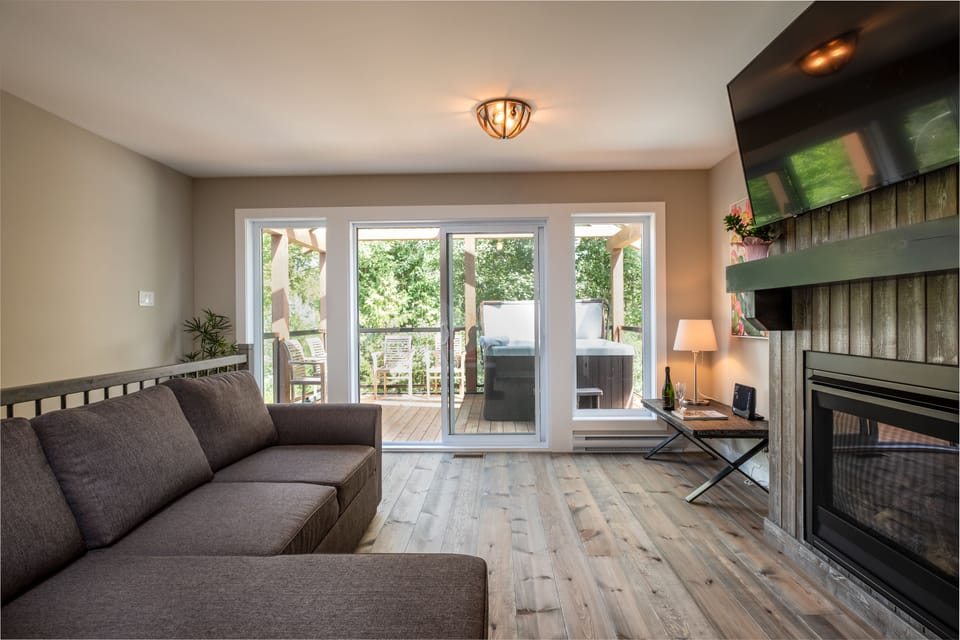 Deluxe Chalet, Multiple Beds, Non Smoking | Living area | 0-inch flat-screen TV with satellite channels, TV