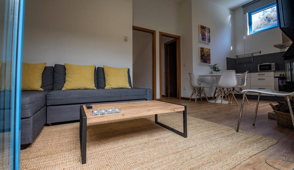 Cabin, 2 Bedrooms (Moucho) | Living area | Plasma TV, fireplace