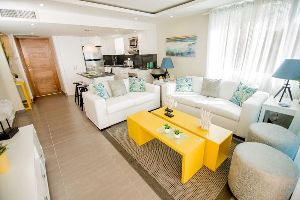 The second floor apartment has an ample living room area with plenty of seating 