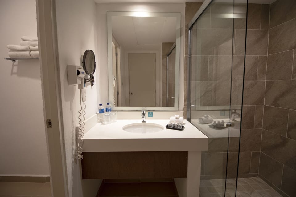Shower, free toiletries, hair dryer, towels