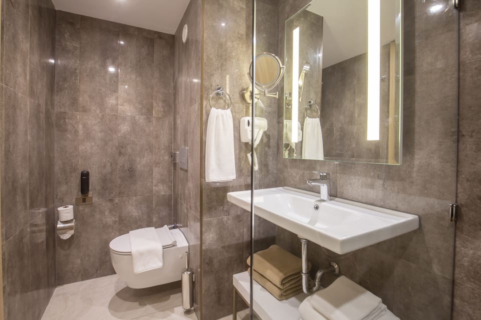 Shower, free toiletries, hair dryer, towels