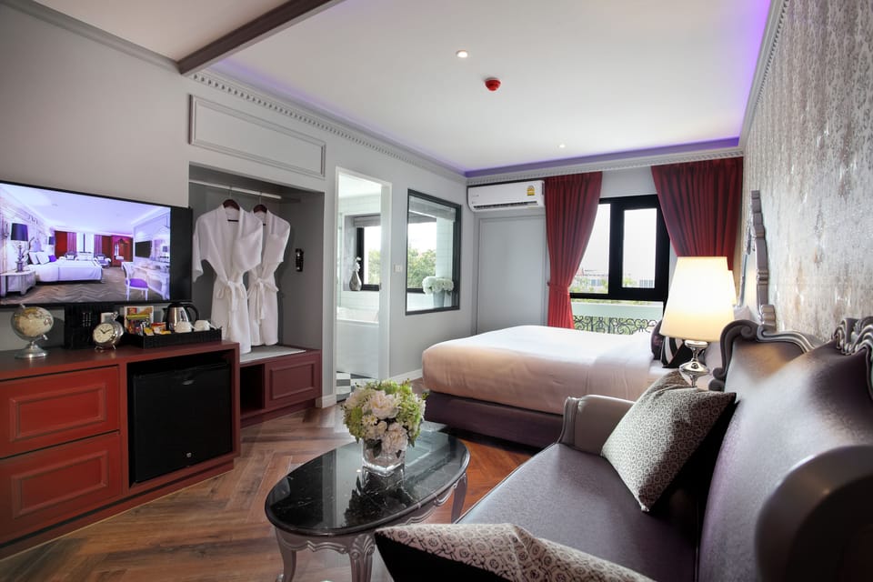 Premier Double Room, Jetted Tub (Street View) | Minibar, in-room safe, individually decorated, individually furnished
