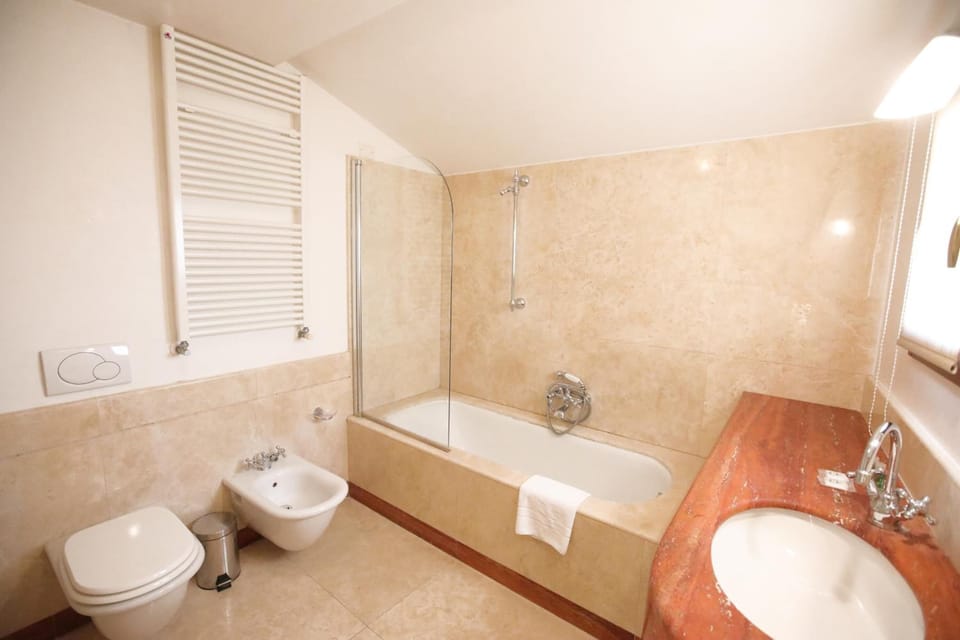 Shower, free toiletries, hair dryer, bidet