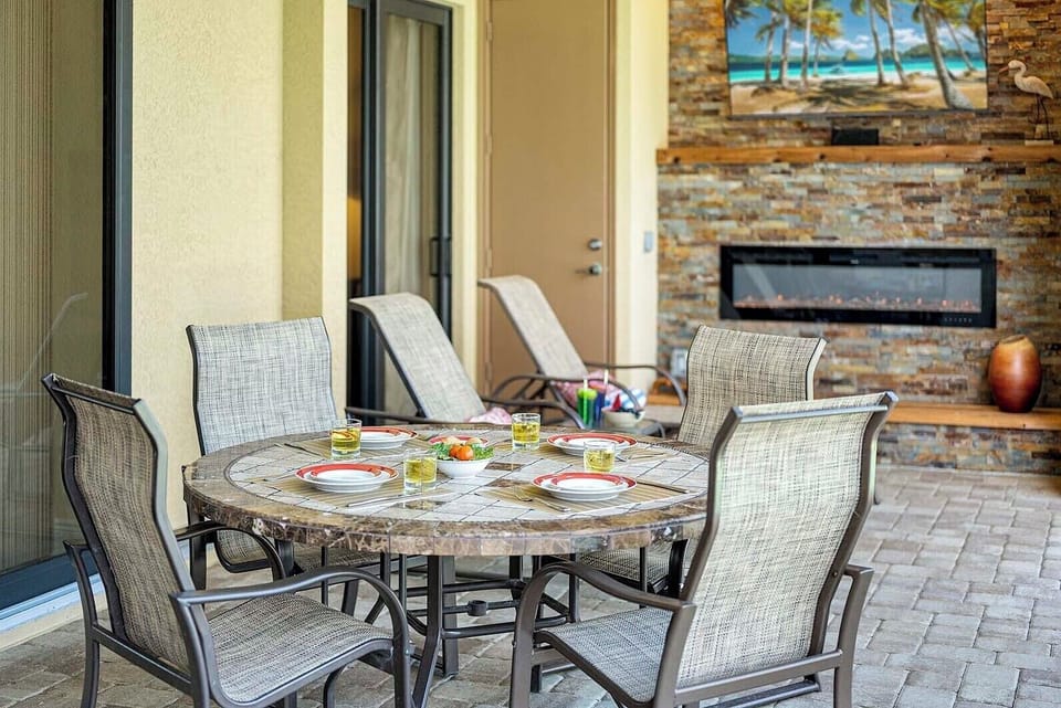 Enjoy Al Fresco Dining with a Fire Place and Some Good Entertainment