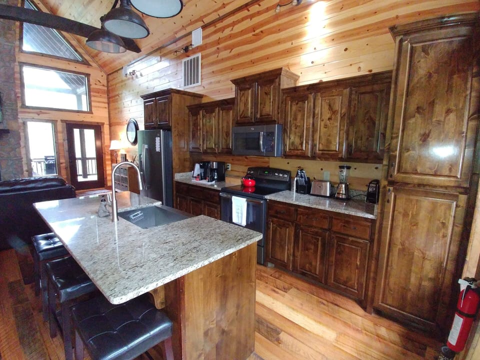 Kitchen with stainless steel appliances and lots of prep space.