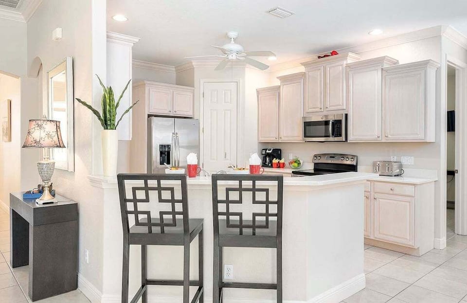 Open Kitchen with Stainless Applicances