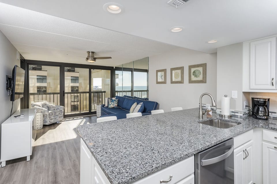 Great Open Floor Plan & seating for 4 at the New Breakfast Bar.