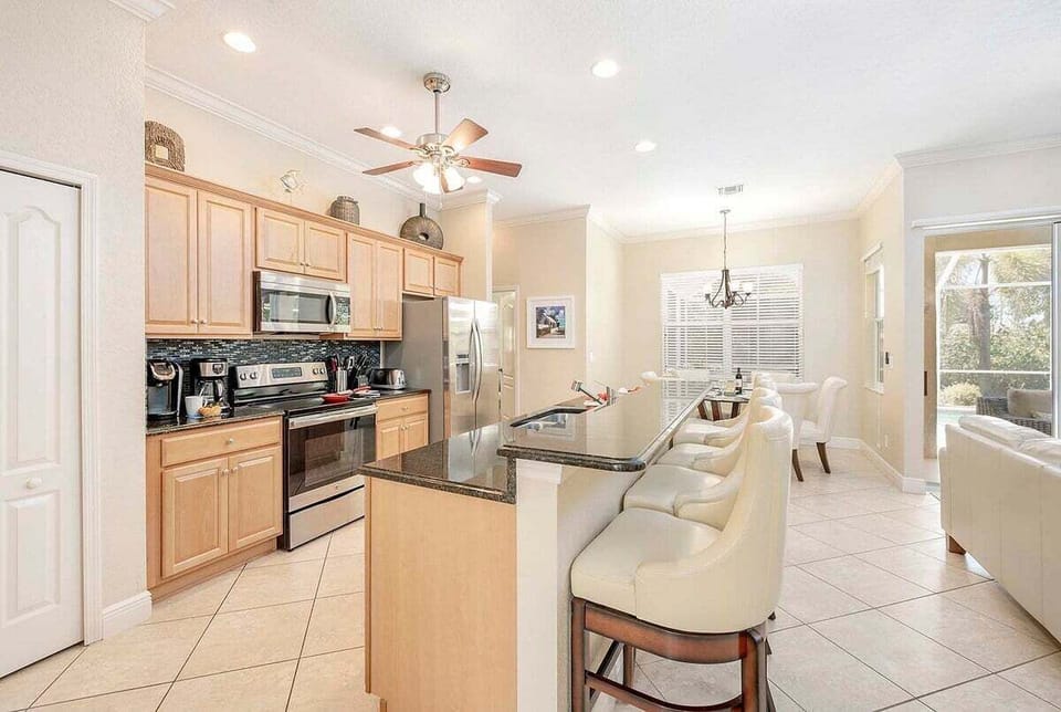 Kitchen with Bar Counters and Additional Seating