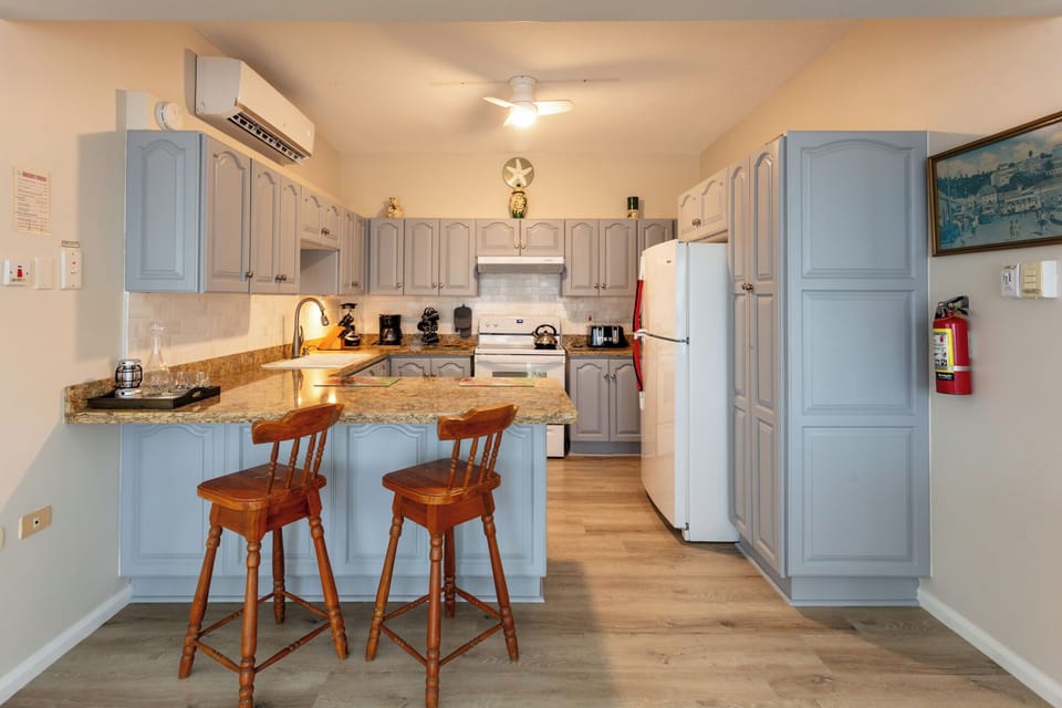An ocean-view full kitchen with all modern amenities.