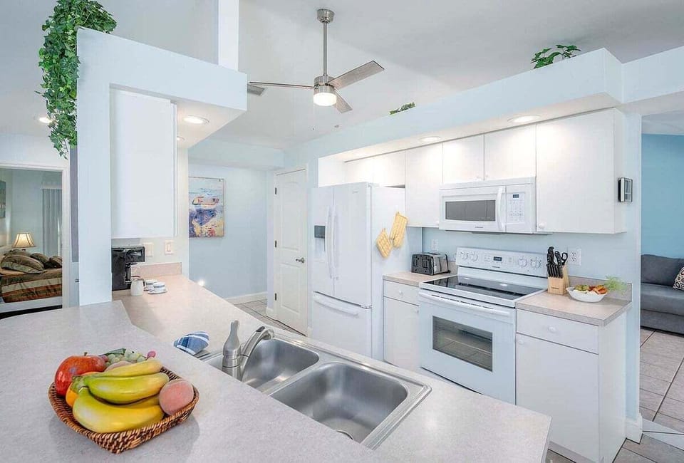 Kitchen with Pantry, Microwave, Stove and Oven, Dishwasher and Disposer