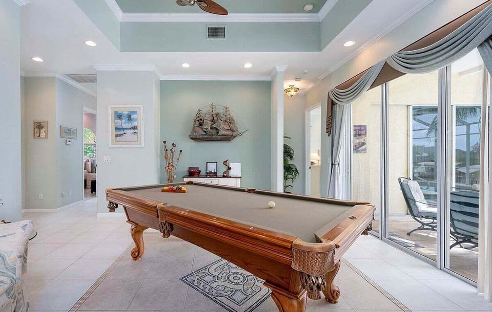 Pool Table in Foyer with View of the Lanai