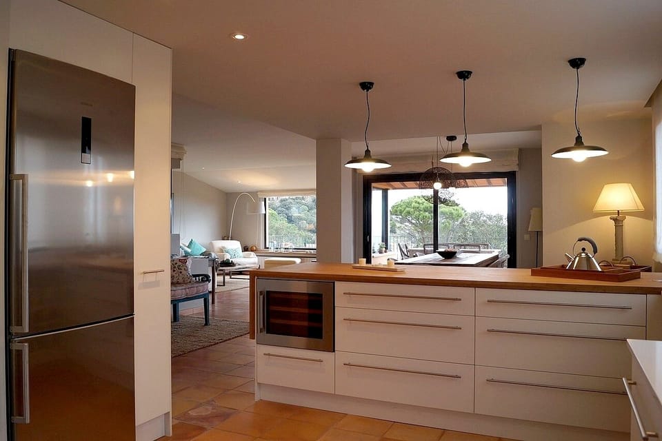 Kitchen looking to the dining area and lounge.