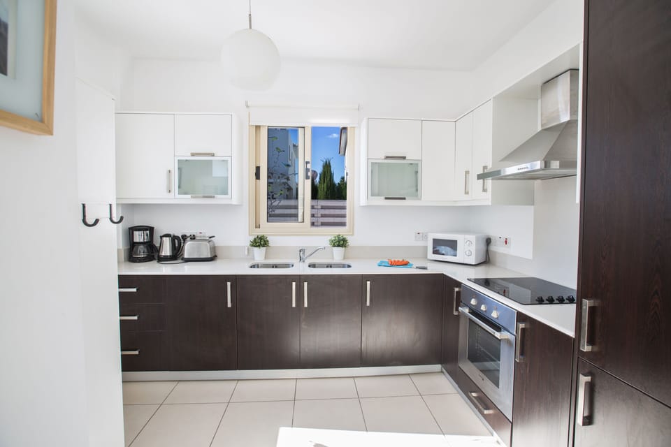 Modern kitchen fully equipped with all appliances and utensils needed