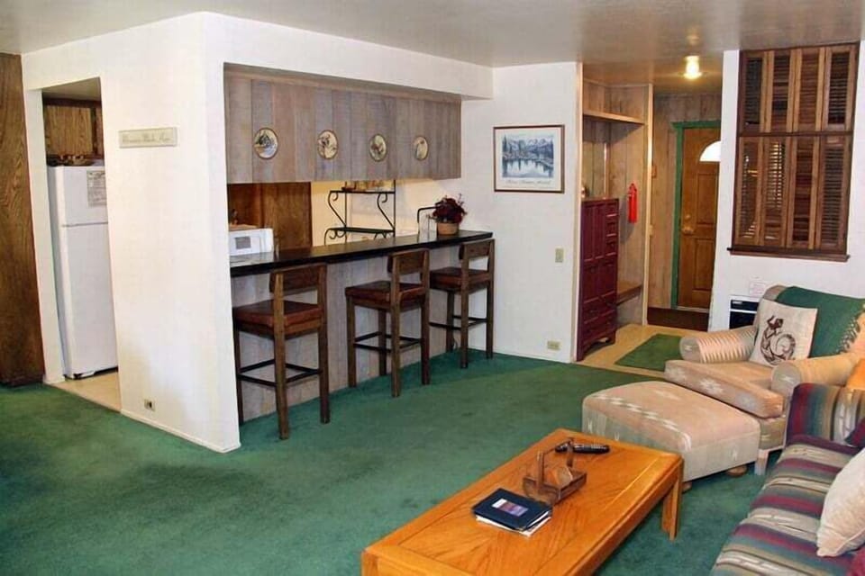 Mammoth Lakes Rental Sunshine Village 177 - Living Room towards Kitchen and Bunk Alcove