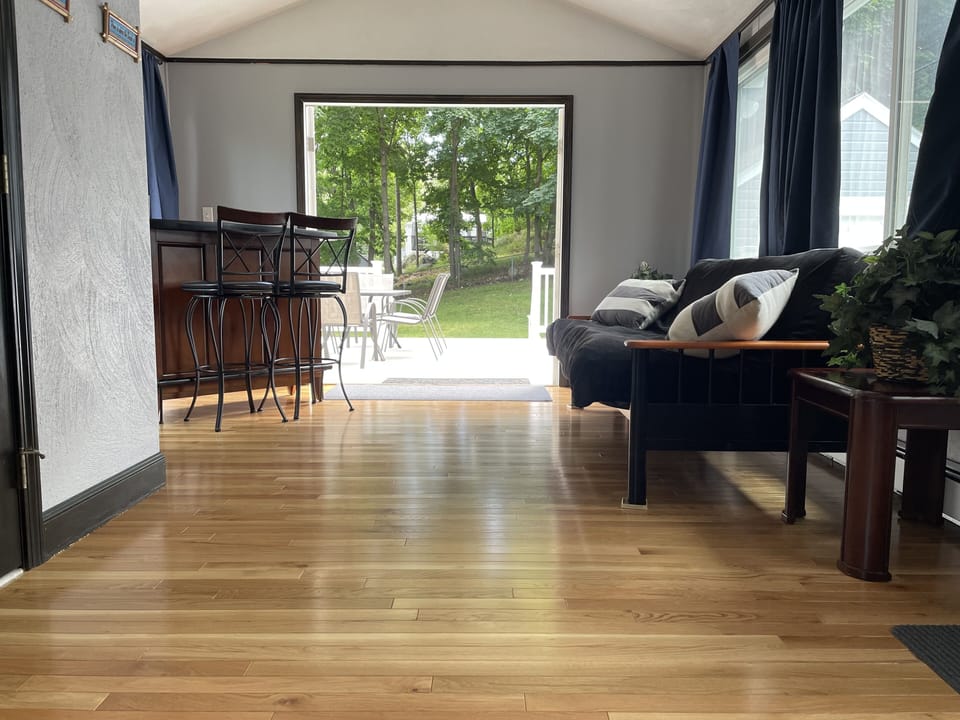 Sunroom also has French doors that open to a 16x16 deck and large fenced-in yard