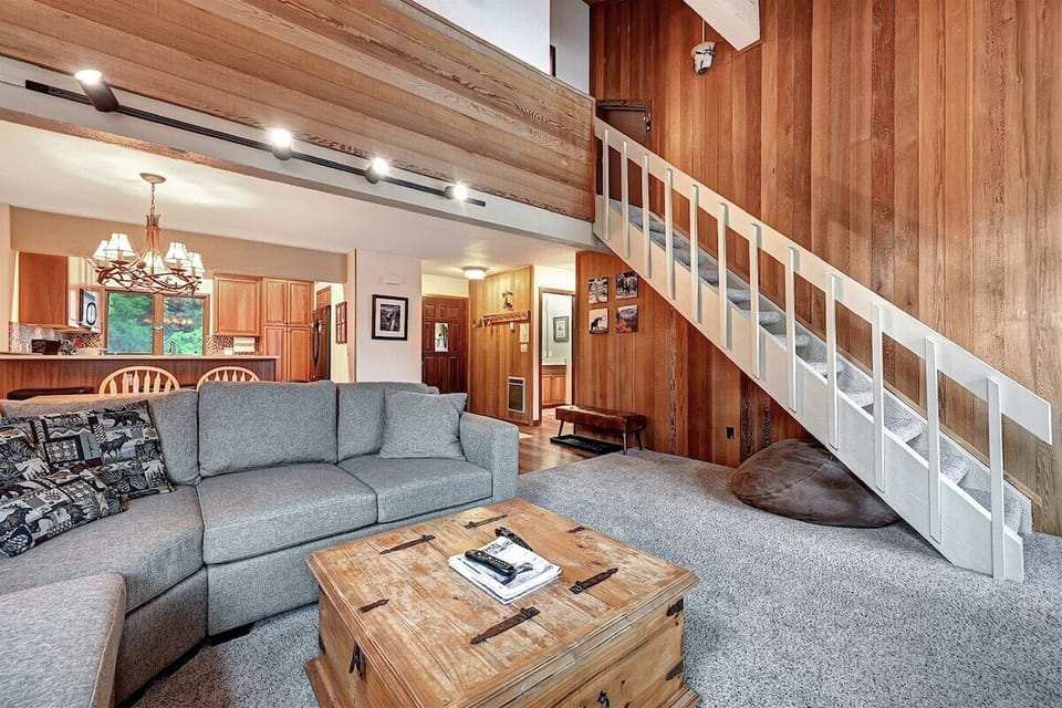 Living room and stairs to the loft