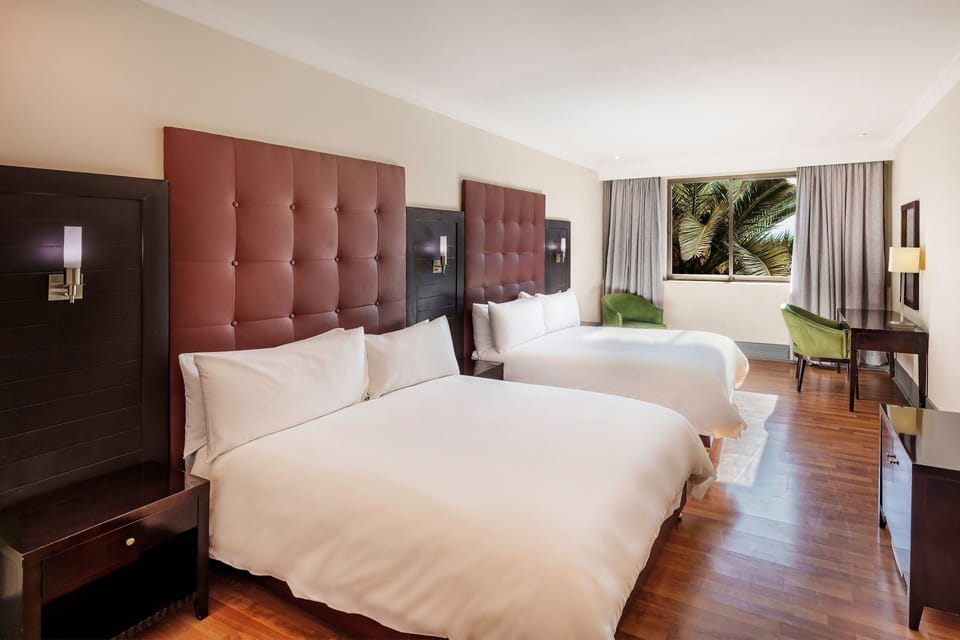 Room, 2 Queen Beds | In-room safe, desk, blackout drapes, iron/ironing board