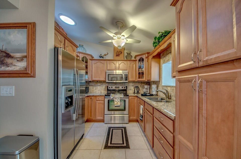 fully stocked kitchen with drip coffee maker