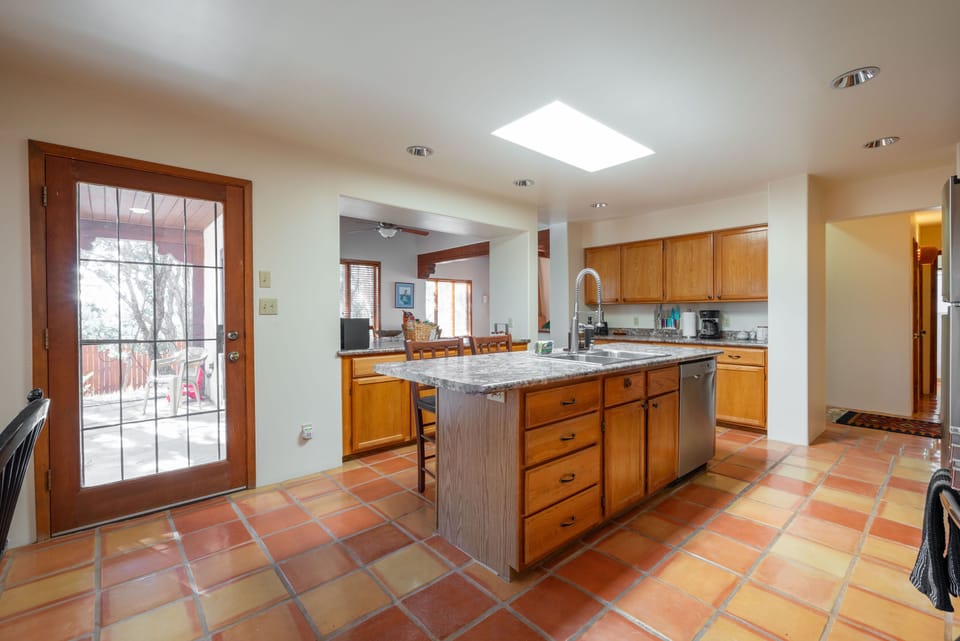 Access the back patio through the kitchen.