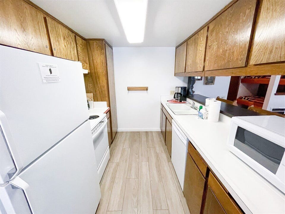 Sunshine Village 173: Fully Equipped Galley Kitchen