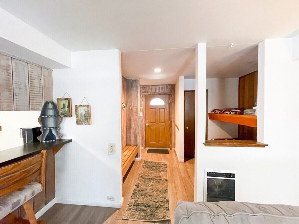 Sunshine Village 173: View From the Living Room to the Front Door, Bunk Area, Storage and Bench