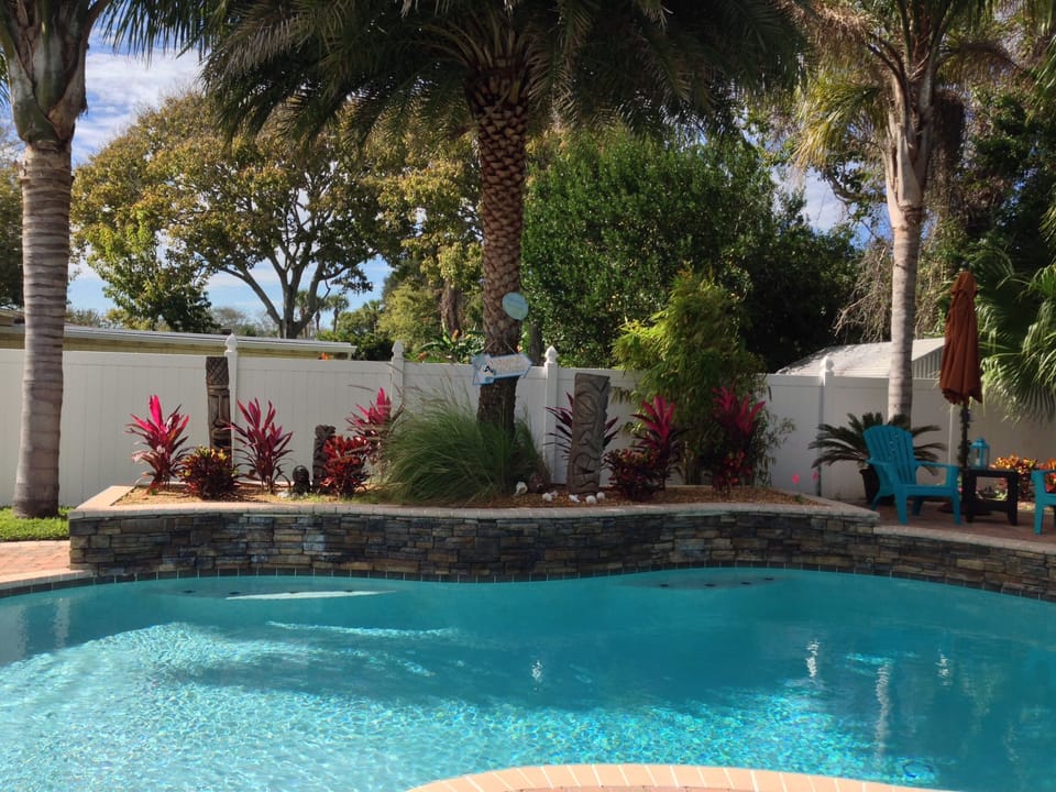 Enjoy full pool view from Great Room.EZ access dbl doors full view glass.