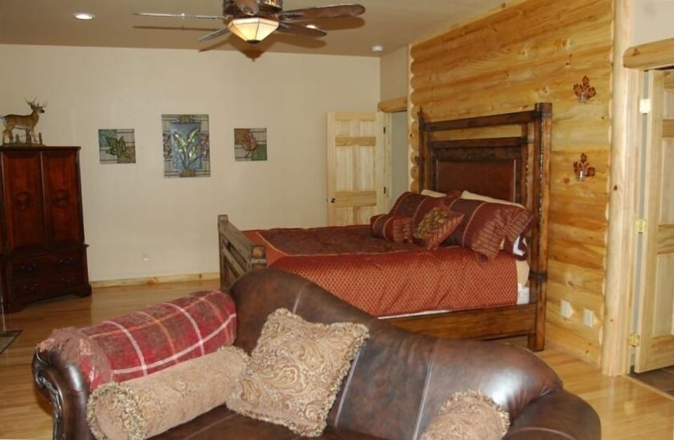 Master bedroom #2 with sofa and private fireplace