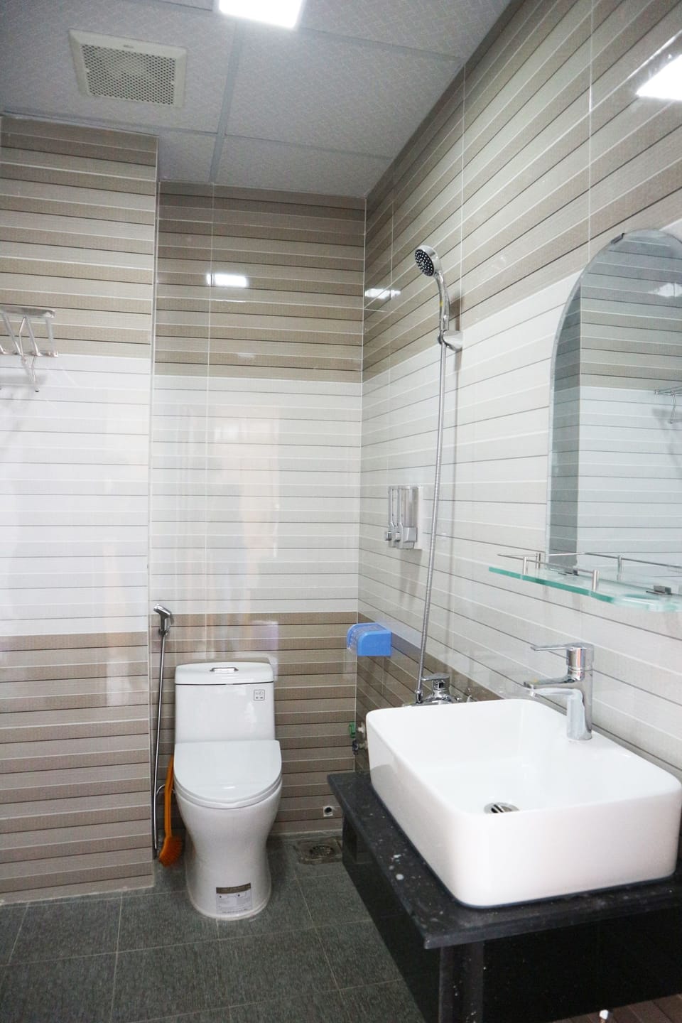 Shower, free toiletries, slippers, towels