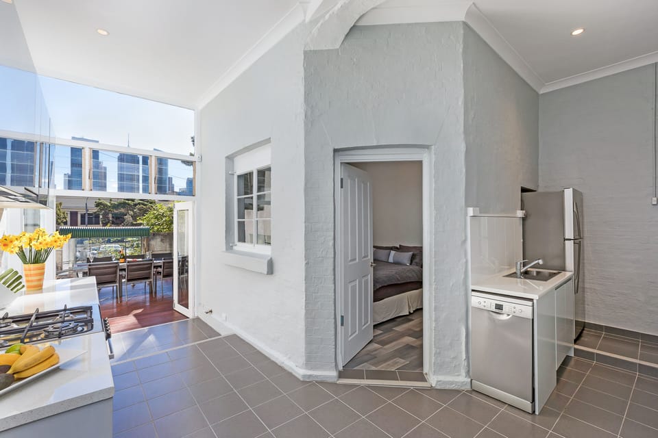 Enjoy the open plan kitchen with panoramic views of the city skyline.