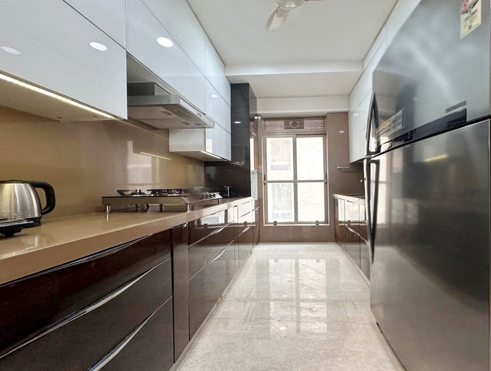 Premium Apartment, 3 Bedrooms | Private kitchen | Coffee/tea maker, electric kettle