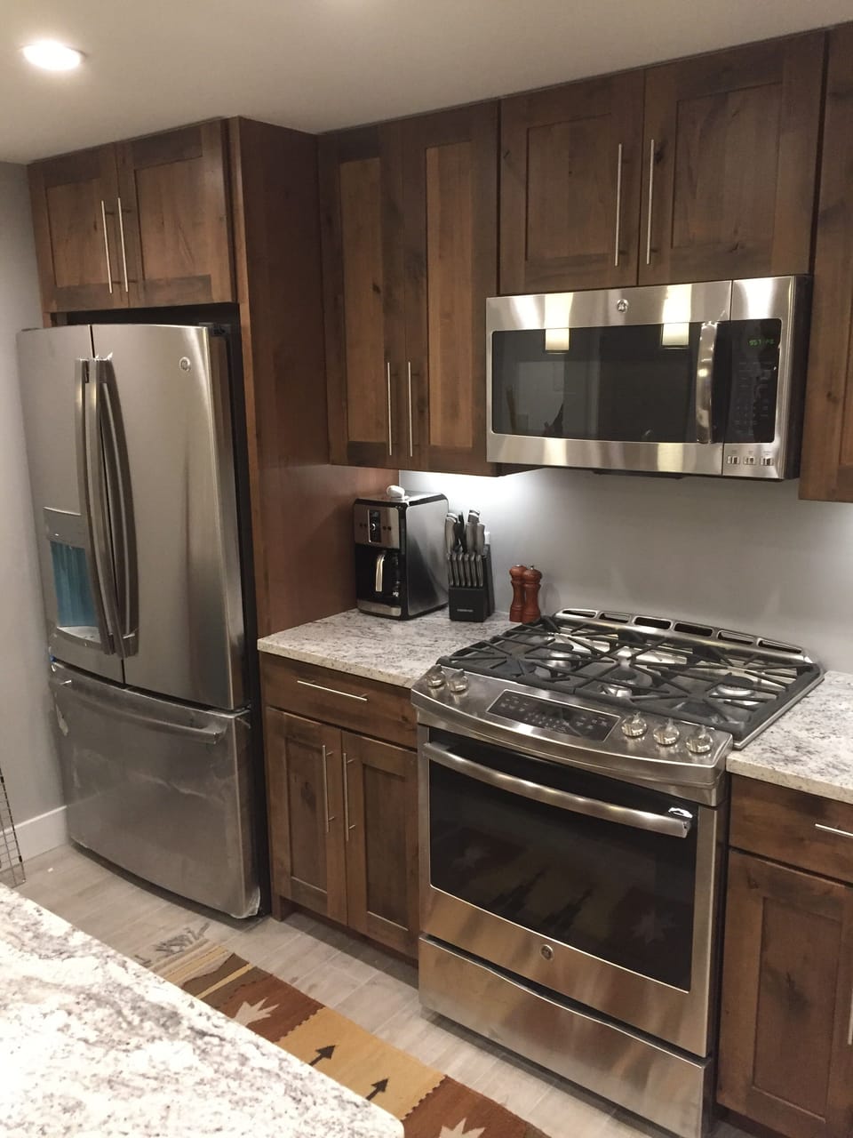 Chef-grade appliances and standard kitchen accessories.