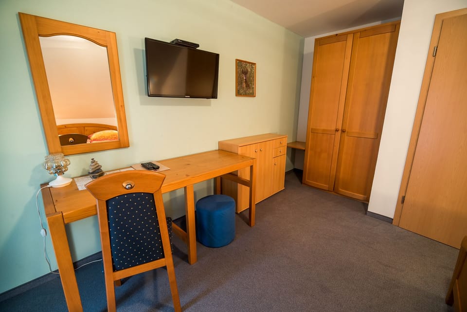 Family Room, 2 Bedrooms, Balcony | Iron/ironing board (on request), WiFi (free), bed sheets