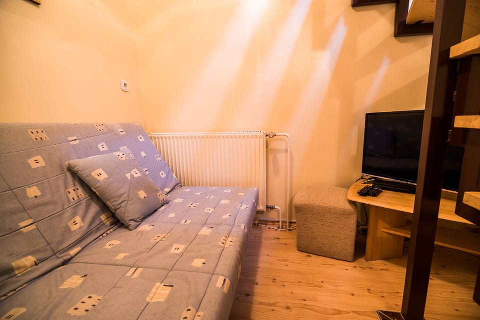 Family Duplex, Balcony | Living area | Flat-screen TV