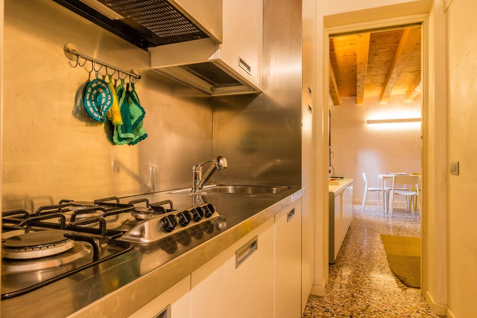 Apartment, 3 Bedrooms | Private kitchen | Full-size fridge, oven, stovetop, dishwasher