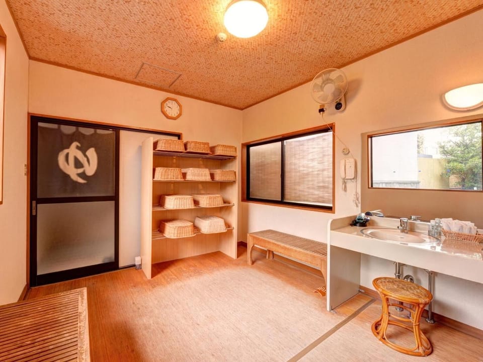 Separate tub and shower, free toiletries, hair dryer, slippers
