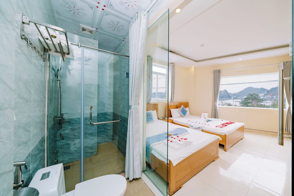 Deluxe Triple Room, 1 Bedroom, Sea View | Minibar, desk, blackout drapes, soundproofing