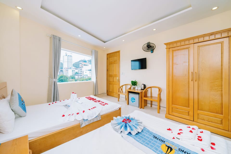 Deluxe Triple Room, 1 Bedroom, Sea View | Minibar, desk, blackout drapes, soundproofing