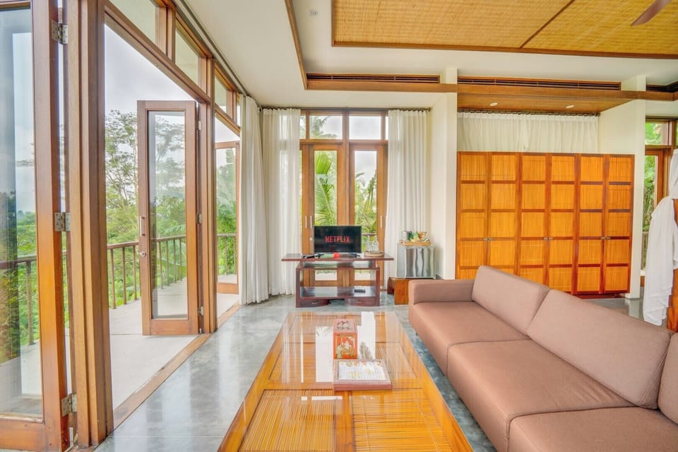 Grand Double Room | Living area | Foosball, books